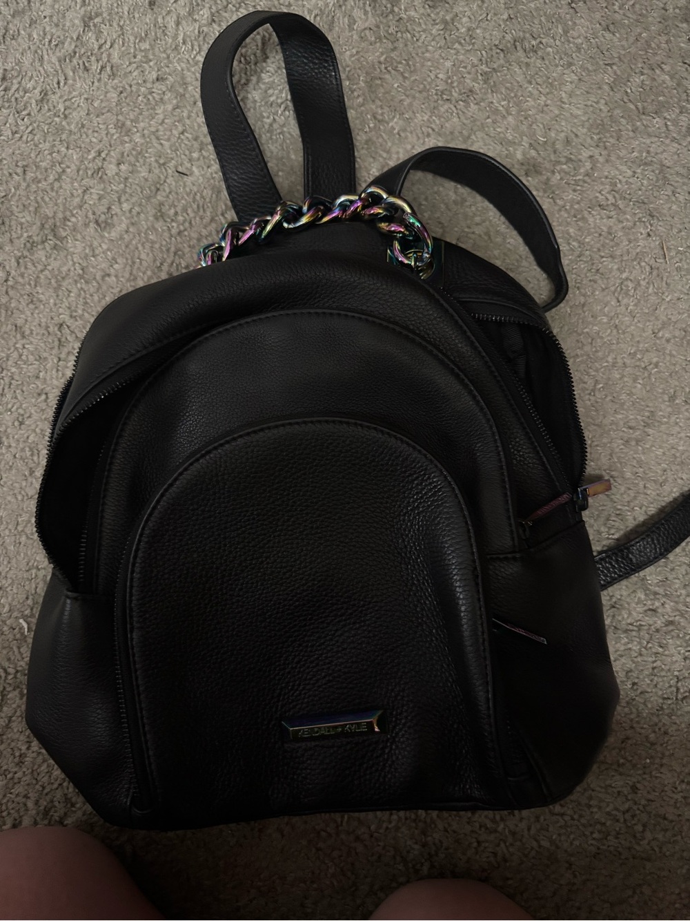 Kendall & Kylie Black Faux Leather Mini Backpack with Iridescent Chain